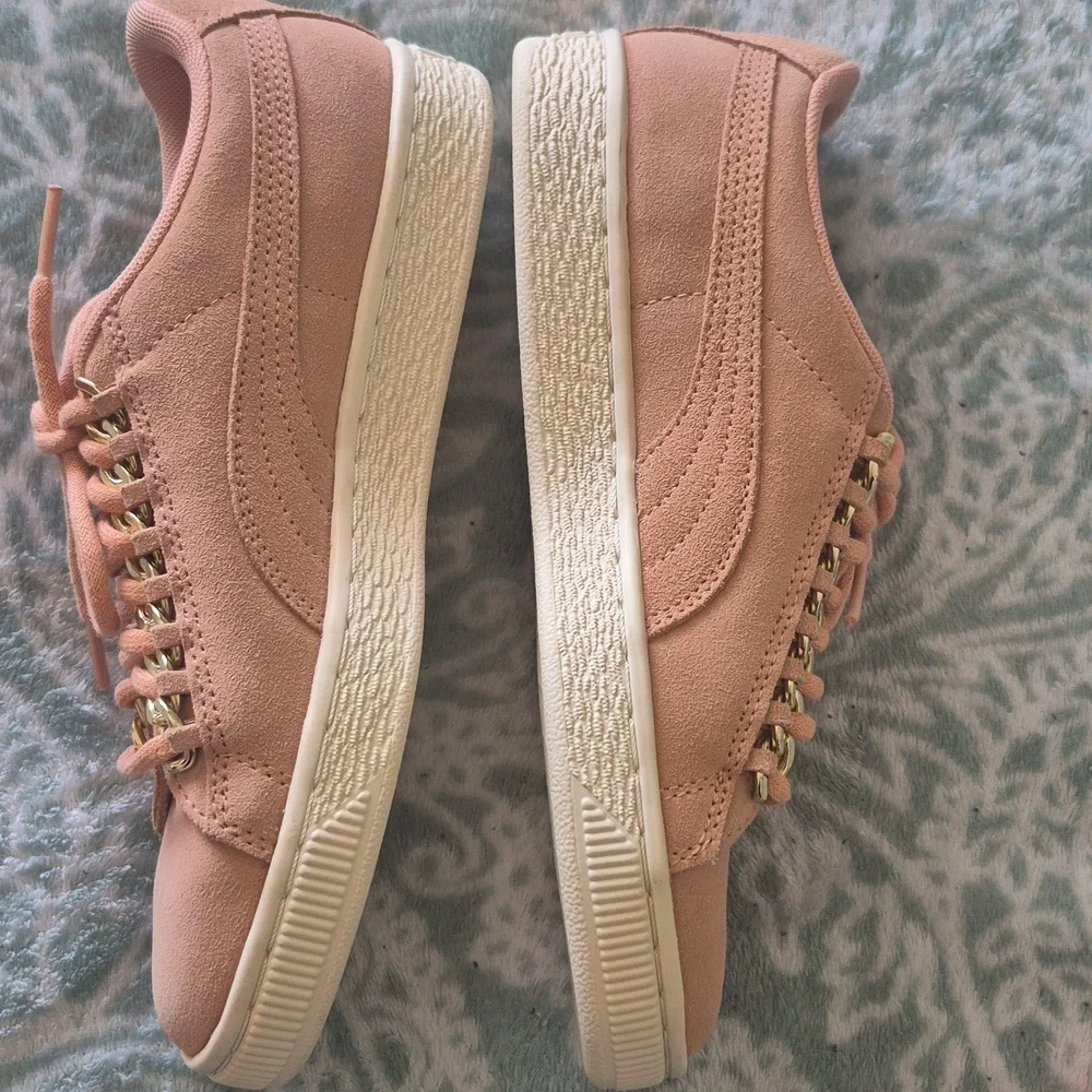 Puma Pink Suede Low-Top Sneakers with Gold Accents